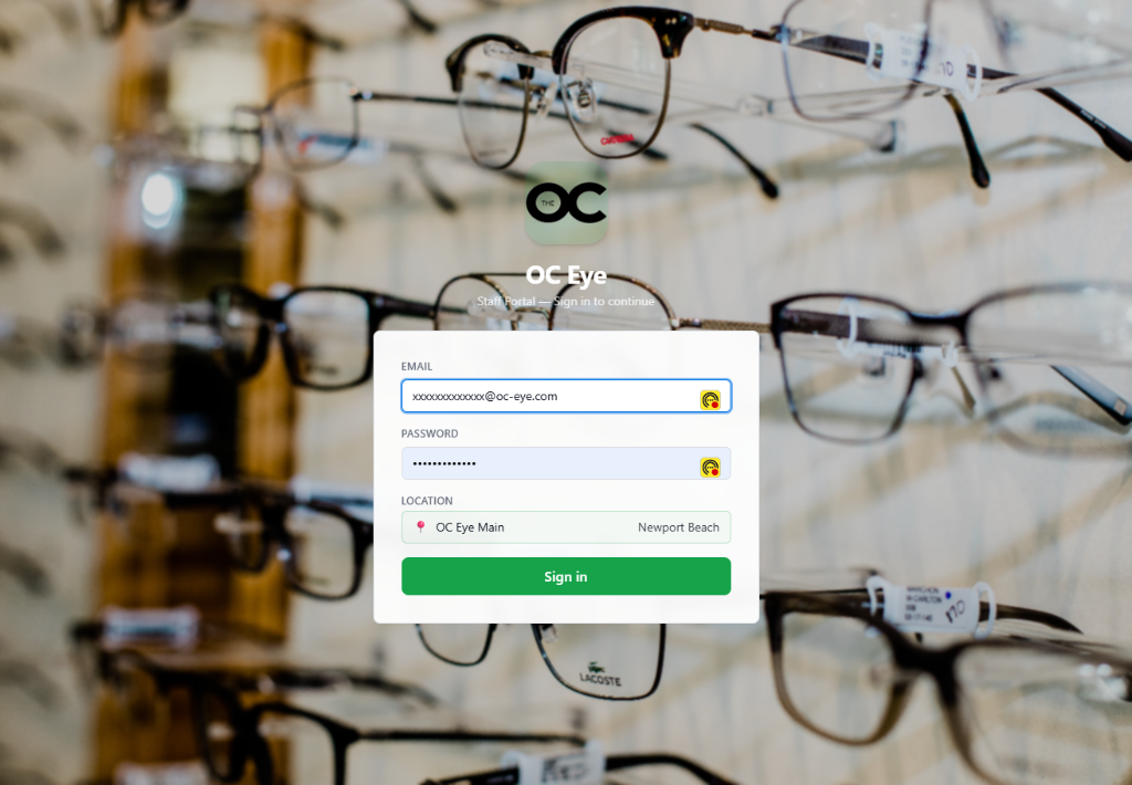 OC Eye branded staff portal login with custom logo and eyewear background